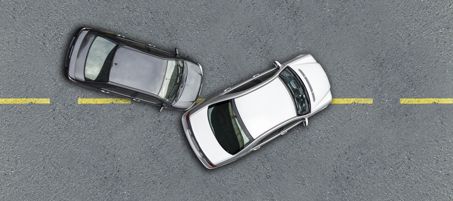 Aerial photo of two cars in a minor accident