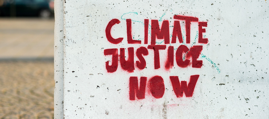 Climate justice now sign